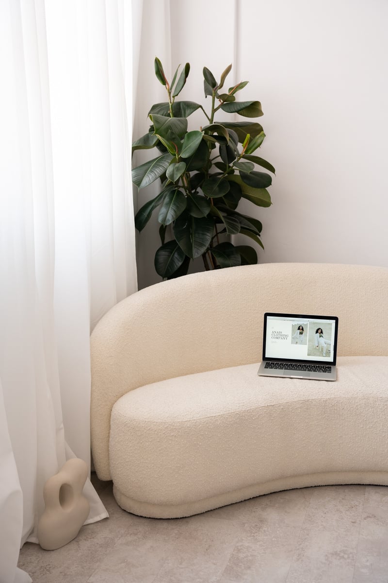 Branding Collaterals Laptop in a Living Room